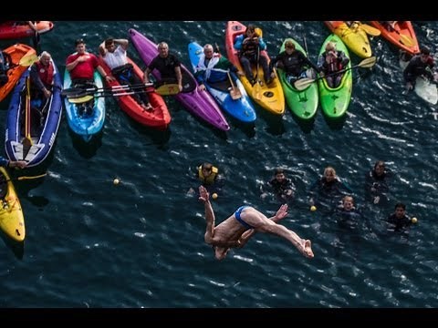 Cliff diving action in the Blue Lagoon - Red Bull Cliff Diving World Series 2013